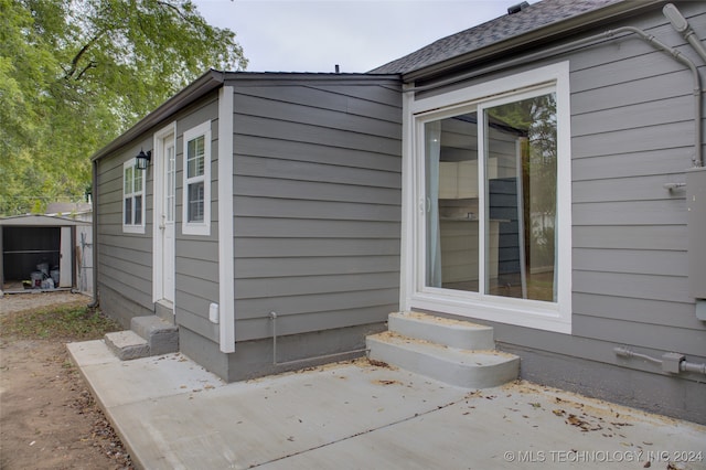 view of property exterior featuring a patio