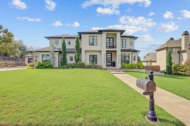 view of front of property with a front lawn