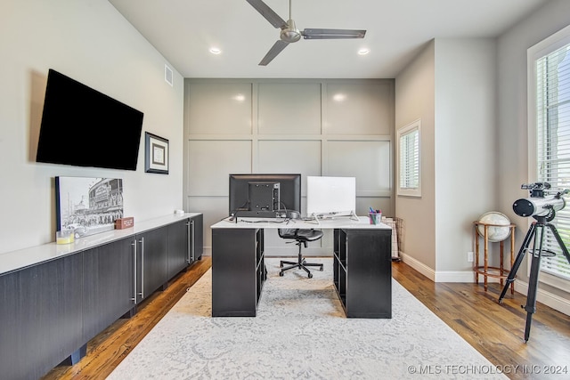 office space featuring ceiling fan and hardwood / wood-style flooring