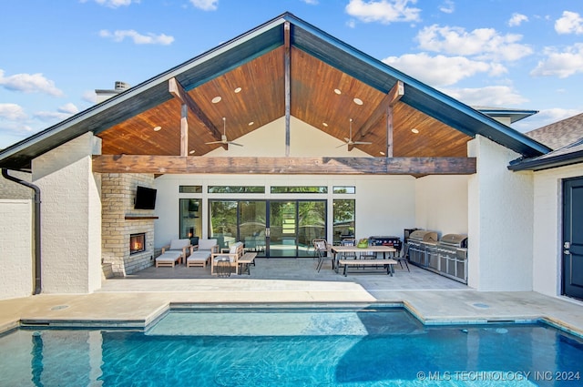 view of pool featuring ceiling fan, an outdoor living space with a fireplace, a grill, and a patio