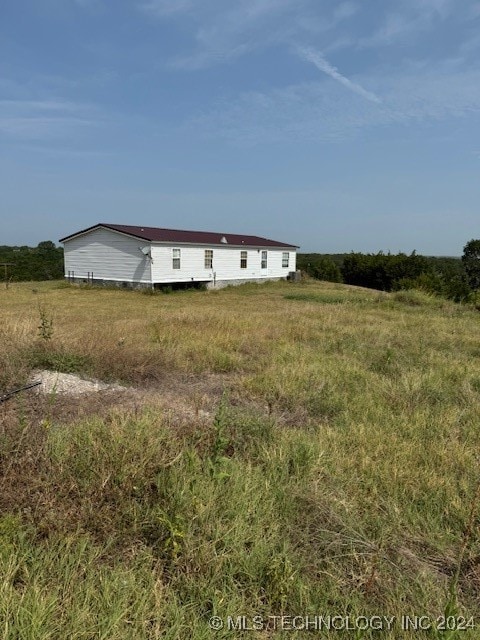 exterior space featuring a rural view