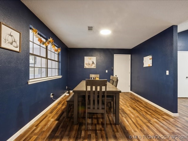 dining area featuring hardwood / wood-style floors