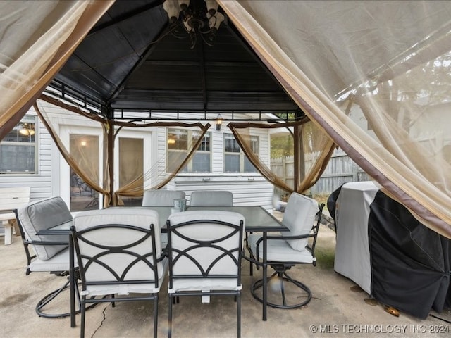 exterior space featuring a gazebo and grilling area