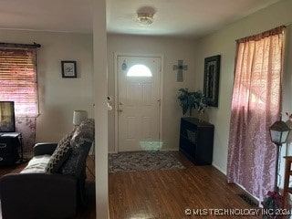 entrance foyer with hardwood / wood-style floors