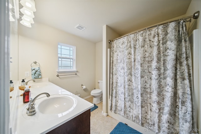 bathroom with tile patterned flooring, vanity, toilet, and a shower with shower curtain