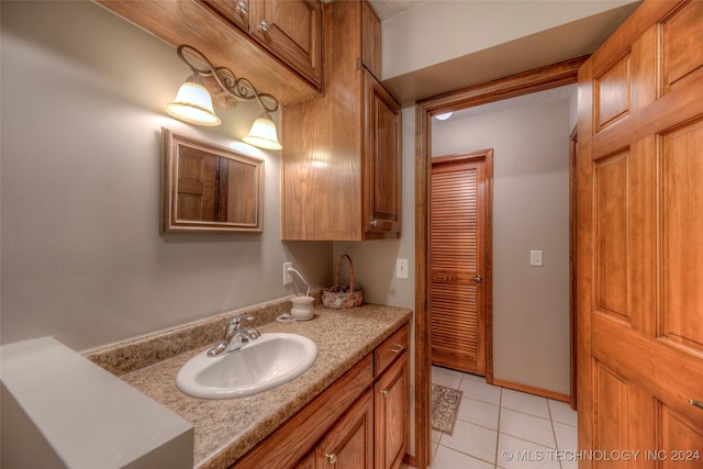 bathroom with vanity and tile patterned floors