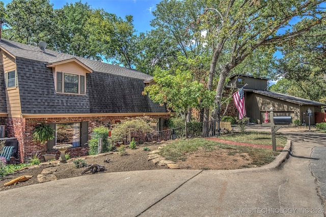 view of property exterior featuring a garage