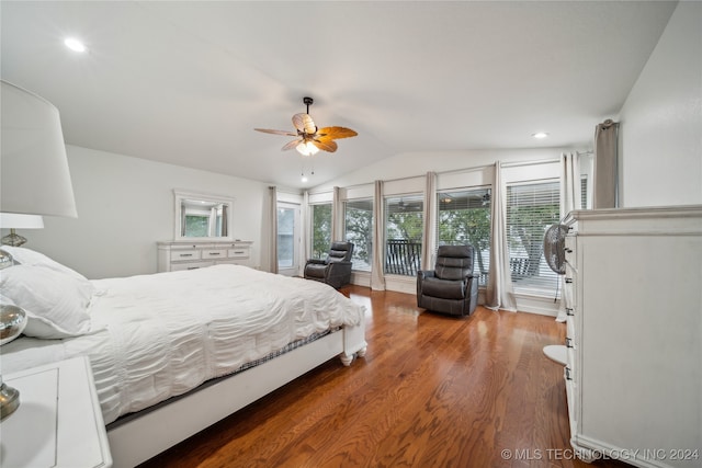 bedroom with ceiling fan, vaulted ceiling, dark wood-type flooring, and access to exterior