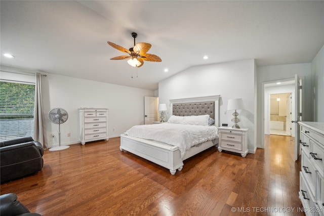 bedroom with lofted ceiling, dark hardwood / wood-style floors, and ceiling fan