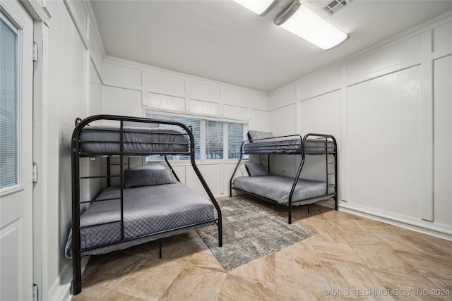 bedroom featuring ornamental molding