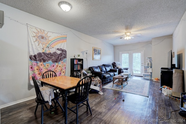 dining area featuring ceiling fan, a textured ceiling, and dark hardwood / wood-style flooring