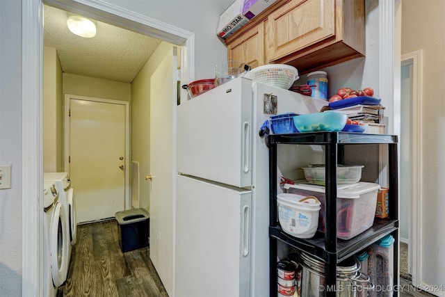 kitchen featuring independent washer and dryer, a textured ceiling, light brown cabinetry, and dark hardwood / wood-style floors