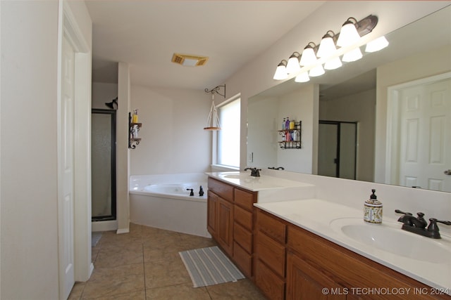 bathroom with vanity, separate shower and tub, and tile patterned floors