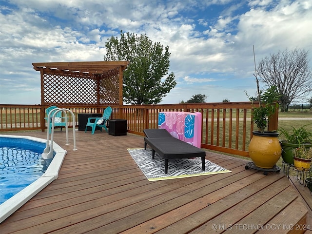 wooden deck featuring a pergola