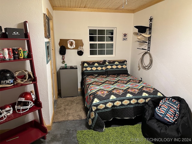 bedroom featuring carpet, wood ceiling, and ornamental molding