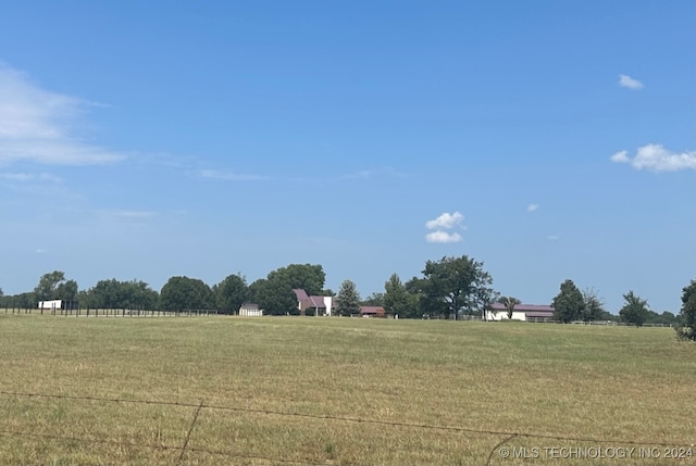 exterior space with a rural view