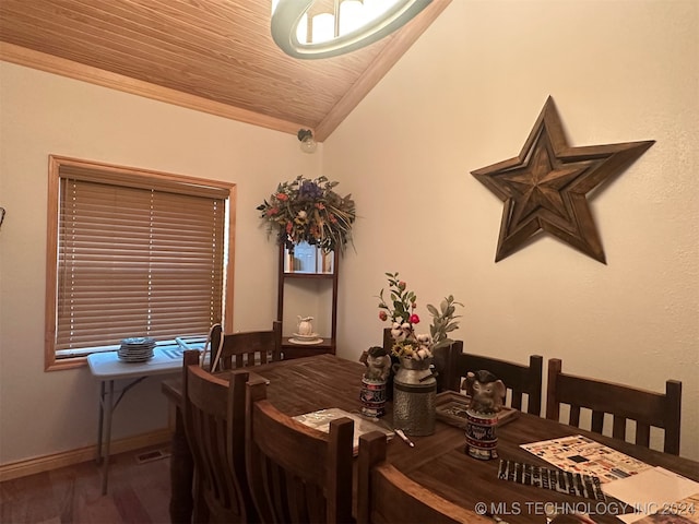 dining room with crown molding, wood ceiling, vaulted ceiling, and hardwood / wood-style floors