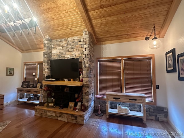 unfurnished living room with wood ceiling, vaulted ceiling, a fireplace, and hardwood / wood-style floors