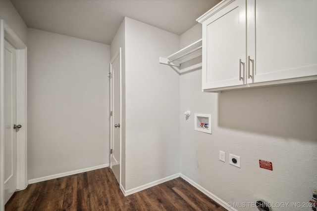 laundry area with hookup for a washing machine, dark hardwood / wood-style floors, electric dryer hookup, and cabinets