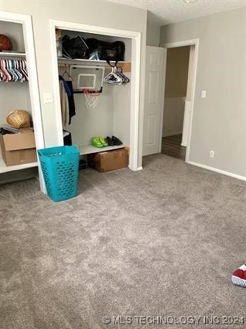 bedroom featuring a closet and carpet floors