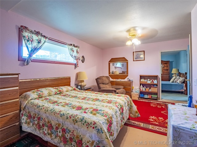 bedroom featuring ceiling fan