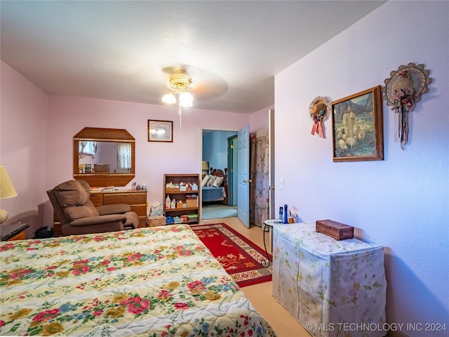 bedroom featuring ceiling fan