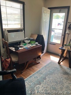 office area with light hardwood / wood-style floors