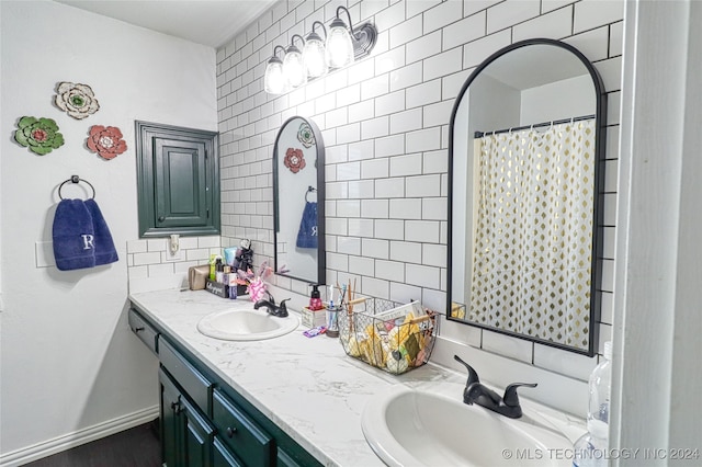 bathroom with vanity and walk in shower