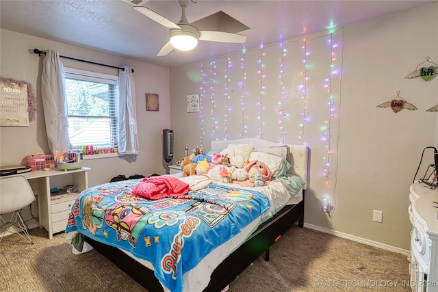 bedroom featuring ceiling fan and carpet floors