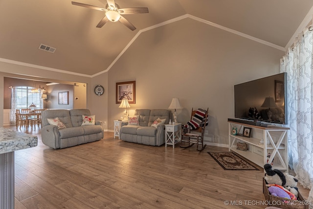 living room with high vaulted ceiling, ceiling fan, hardwood / wood-style flooring, and crown molding