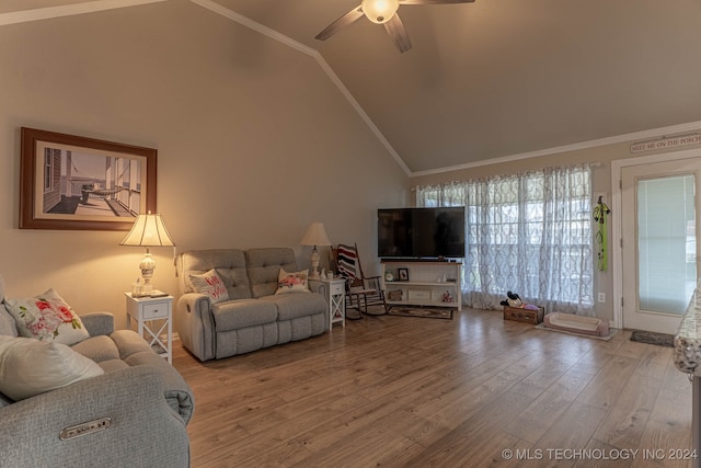 living room with crown molding, vaulted ceiling, hardwood / wood-style floors, and ceiling fan