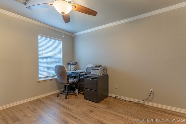 office space featuring light wood-type flooring, ornamental molding, and ceiling fan