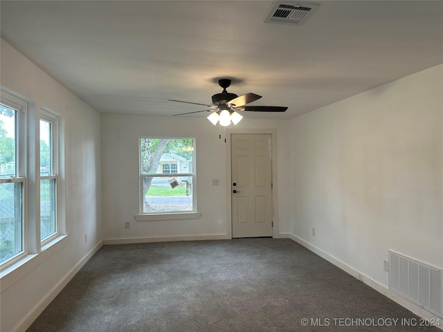 carpeted empty room with ceiling fan