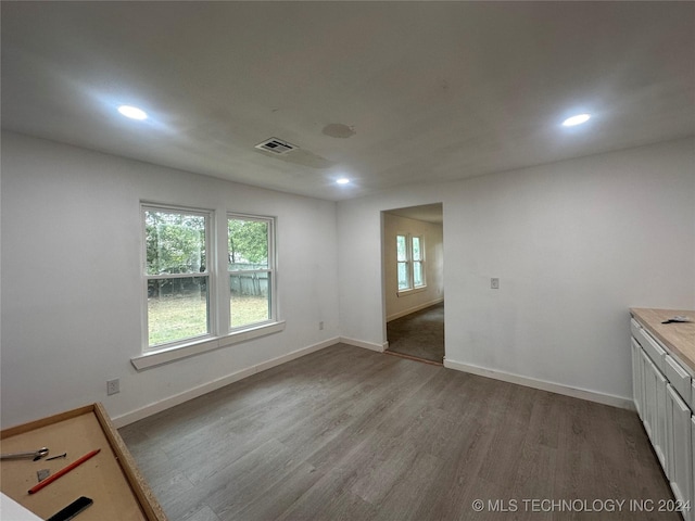 interior space with hardwood / wood-style flooring and a wealth of natural light