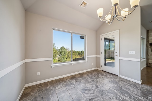 unfurnished dining area featuring vaulted ceiling and a notable chandelier