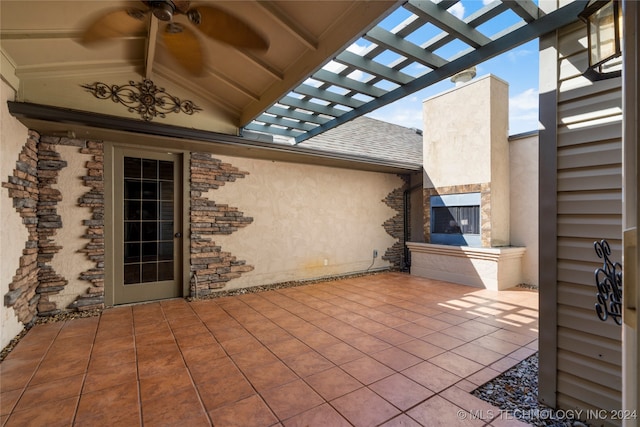 view of patio featuring a pergola and ceiling fan