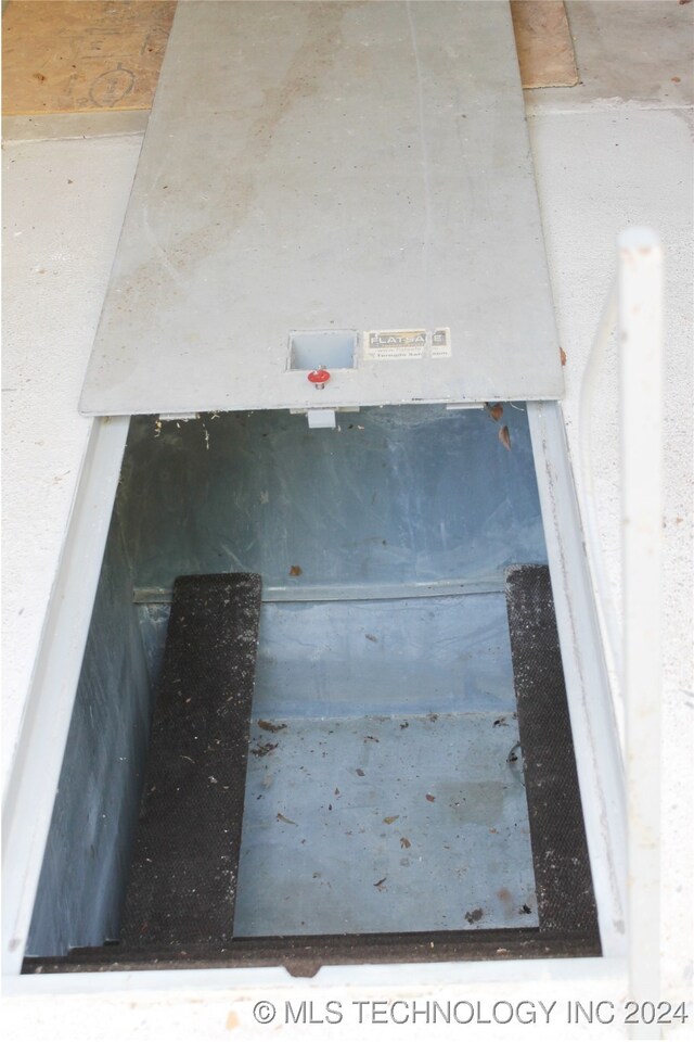 view of entry to storm shelter