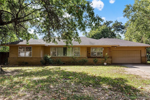 4108 S Saint Louis Ave, Tulsa, OK 74105 - single story home featuring brick siding, an attached garage, and driveway