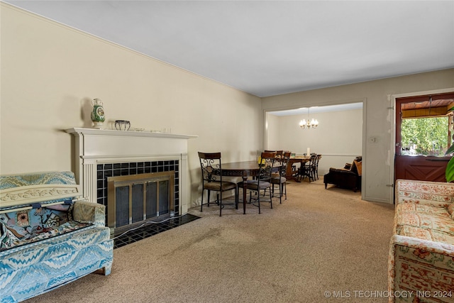 4108 S Saint Louis Ave, Tulsa, OK 74105 - carpeted living area with a chandelier and a fireplace