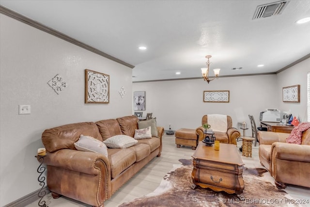 living room featuring ornamental molding and a chandelier