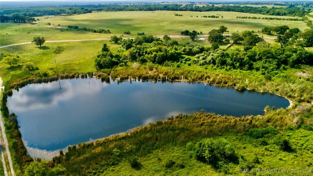 bird's eye view with a water view and a rural view