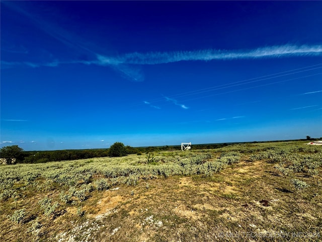 view of landscape with a rural view