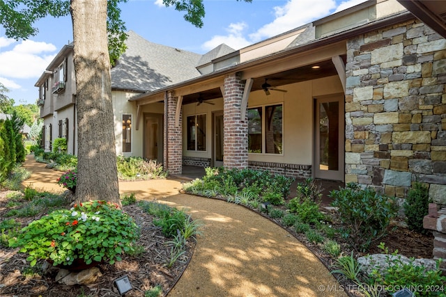 exterior space featuring ceiling fan