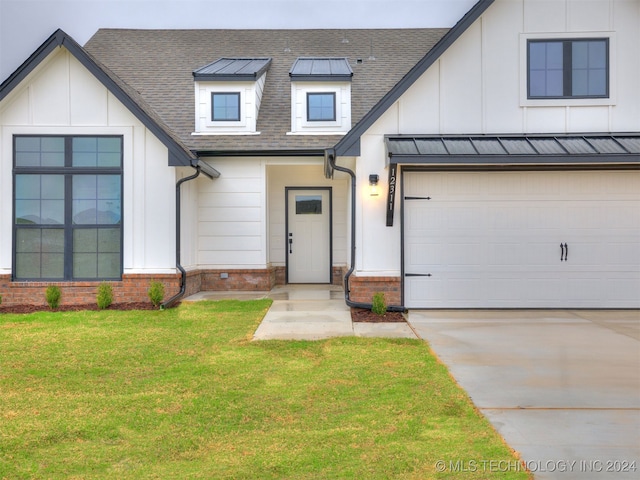 modern farmhouse with a front yard