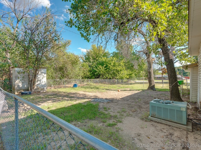 view of yard with central AC