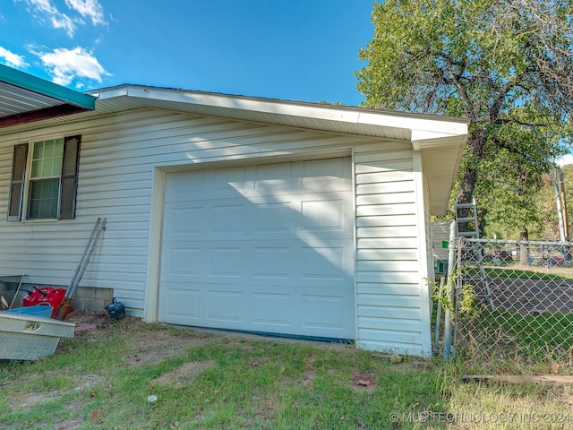 garage with wood walls