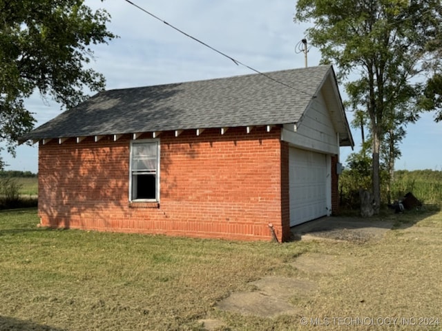 view of home's exterior with a lawn