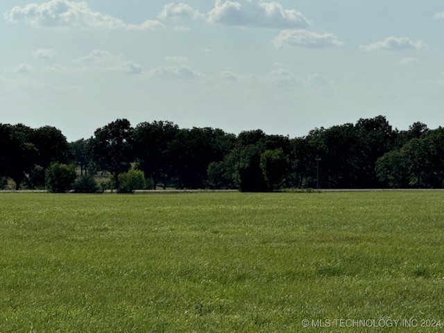 exterior space with a rural view