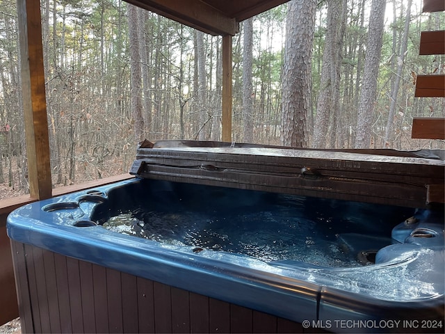 exterior space featuring a jacuzzi