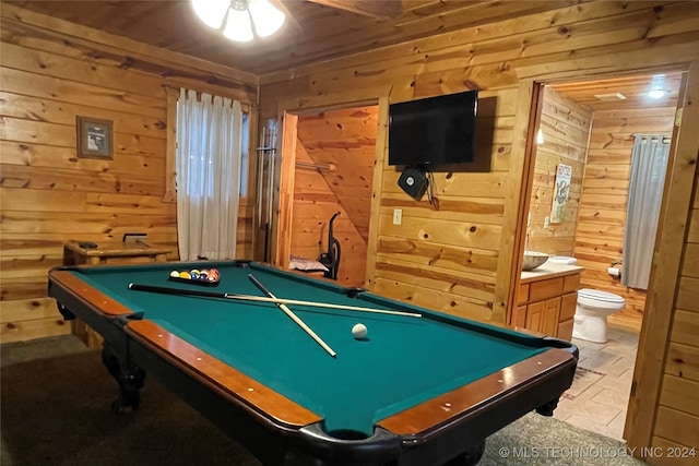 game room featuring wood ceiling, wooden walls, pool table, and ceiling fan